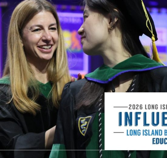 Dr. Ginzburg with student at Commencement ceremony
